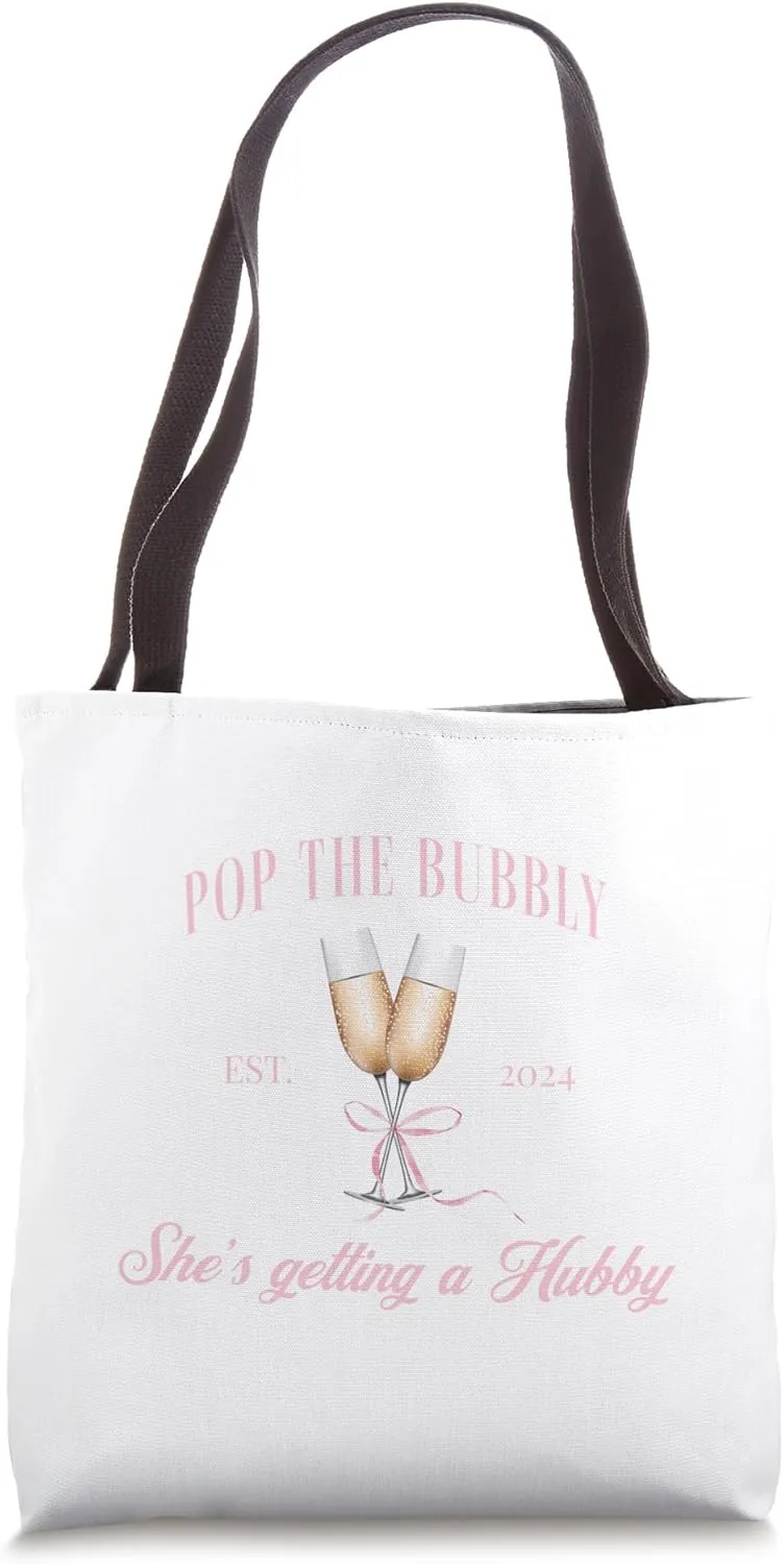 Pop the bubbly she's getting a hubby Bachelorette party Tote Bag